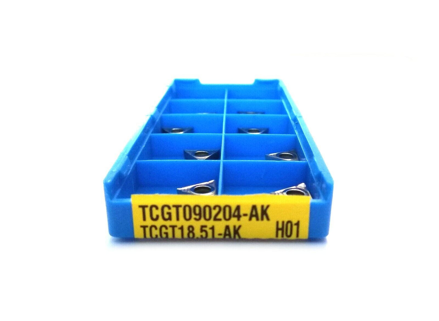 A box of TCGT090204-AK H01 uncoated triangular carbide inserts