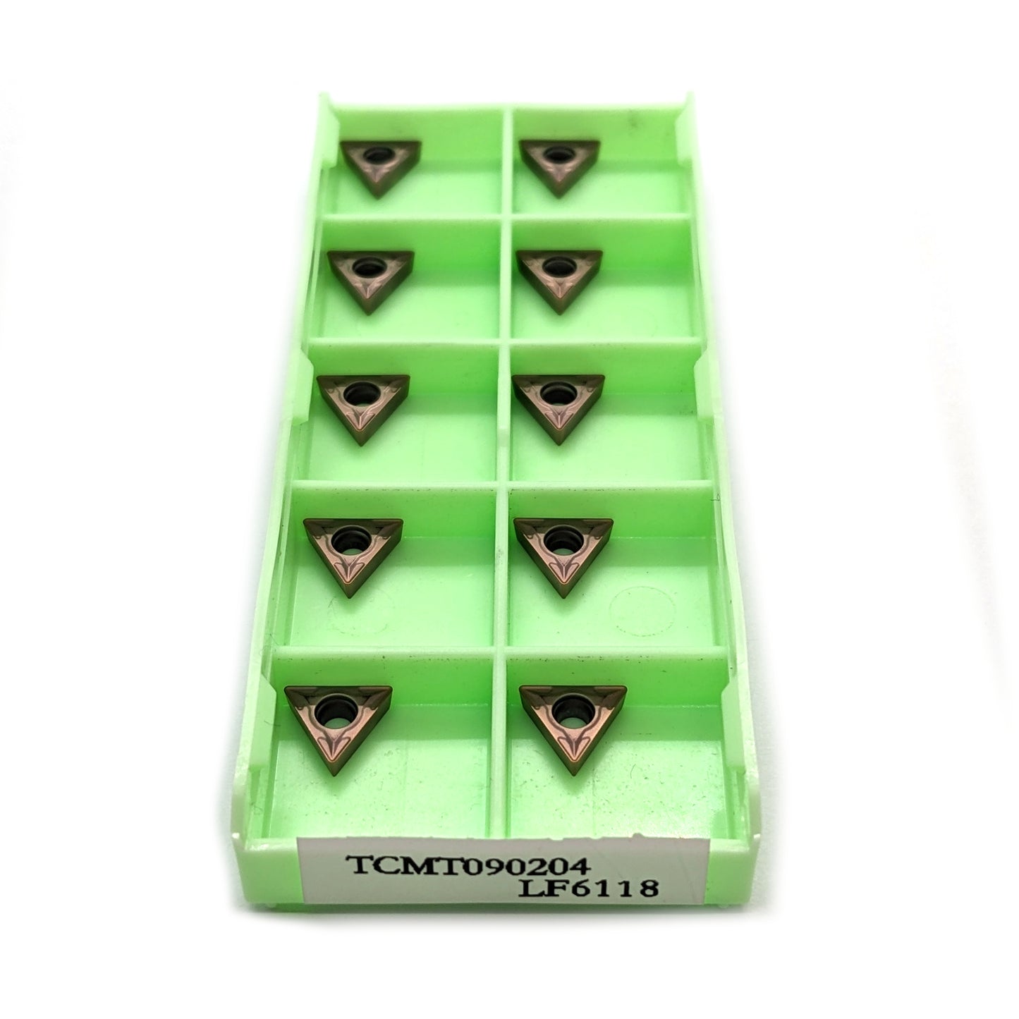 A box of 10 TCMT090204 carbide inserts