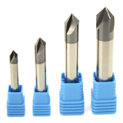 A set of solid carbide 90 degree chamfer mills on a white background