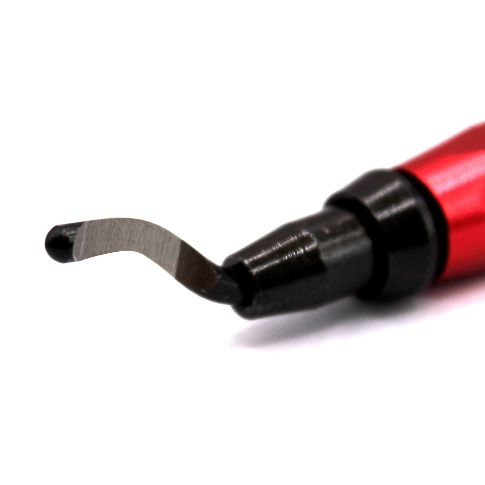 The tip of an anodized deburring tool